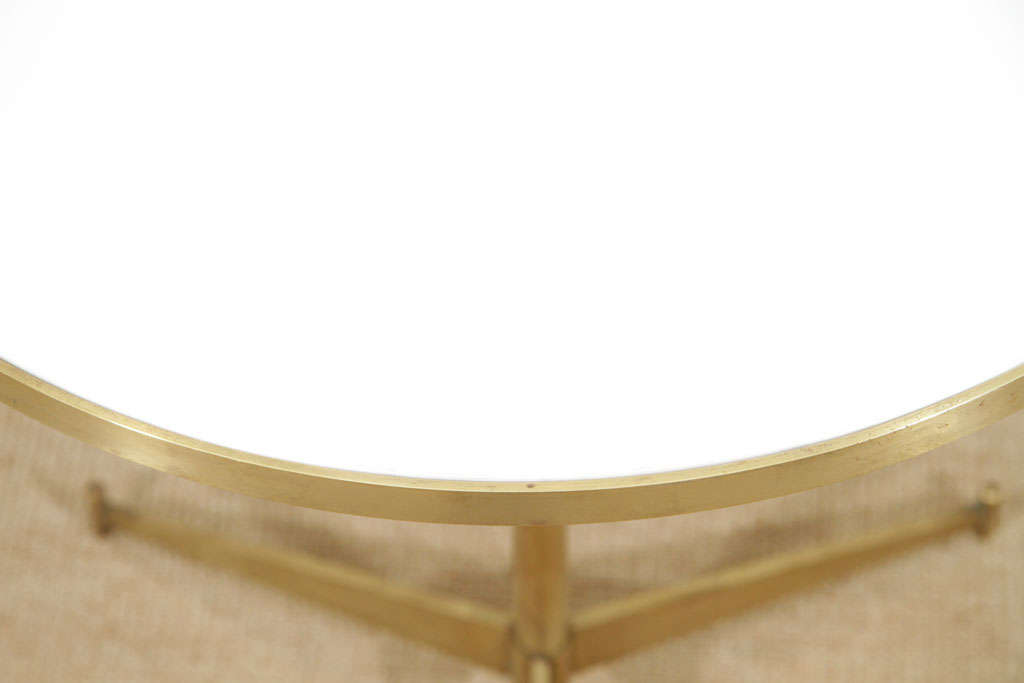 A Pair of Paul McCobb Brass and Opaque White Glass Tables. 1