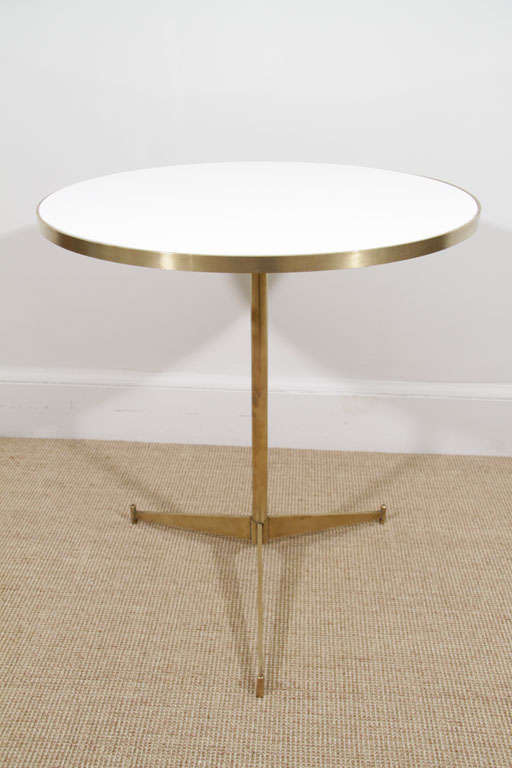 A Pair of Paul McCobb Brass and Opaque White Glass Tables. 2