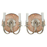 amber colored double arm mirrored sconces with diamond etchings