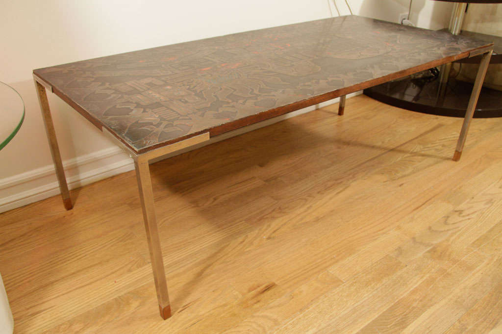 Rectangular bronze cocktail table with Aztec motif