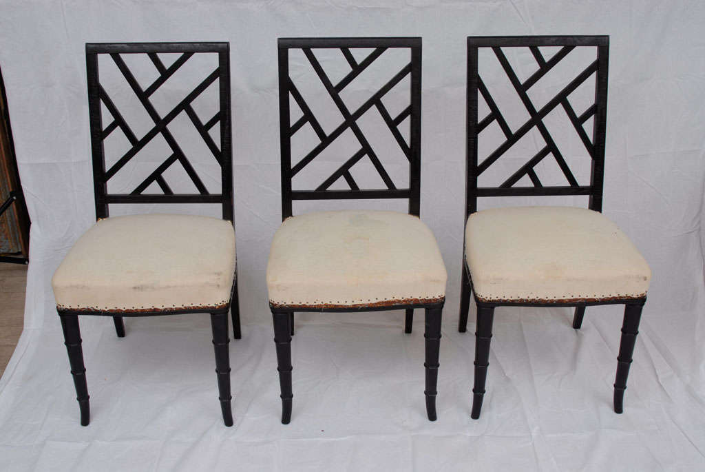 A set of six black painted hahagony lattice back chairs$4500.00 less 10%