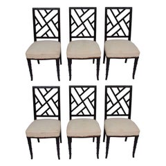 A set of six black painted mahagony lattice back chairs