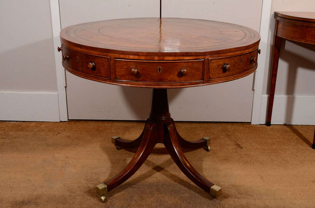British A Pair of 19th Century English Mahogany Drum Tables For Sale