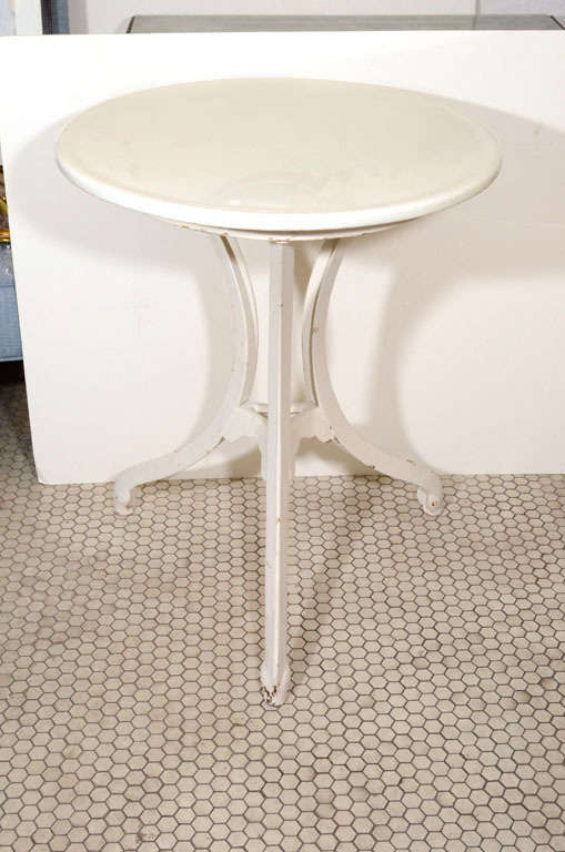 Beautiful Milk Glass Table Top with a 3-leg Cast Iron Base