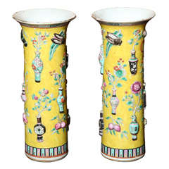 A Pair of Polychrome Enameled Yellow Ground Beaker Vases