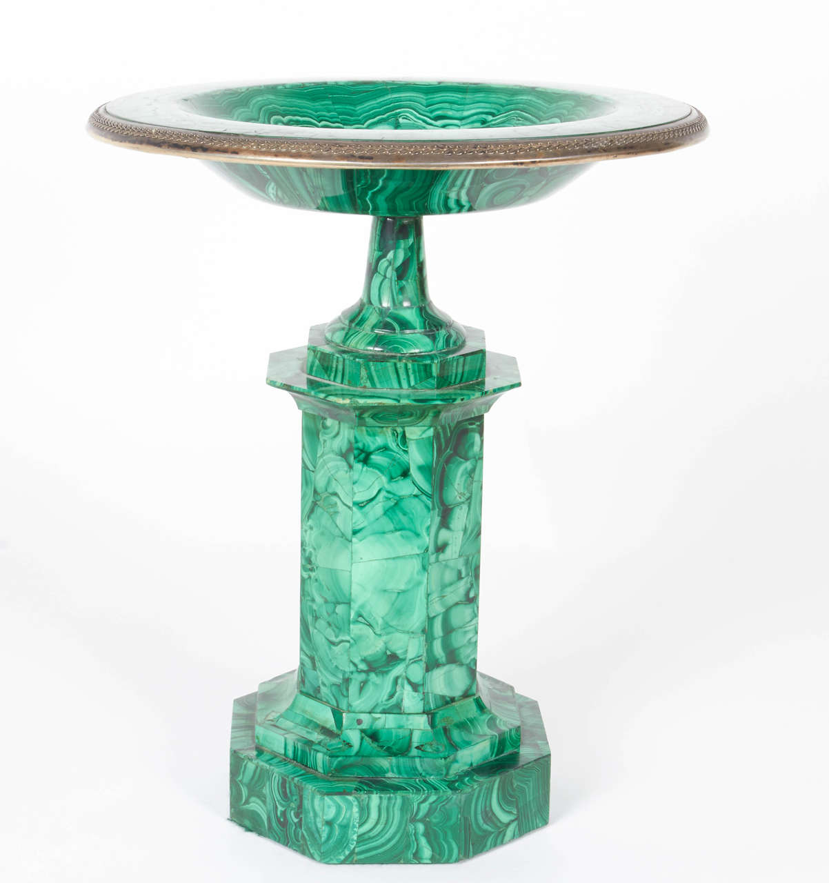A very rare and important neoclassical Russian malachite centerpiece urn with a silver/silvered bronze rim from the Ekaterinburg Faceting Factory, Russia, circa 1830s. Similar pieces can be seen in the Hermitage Palace Museum.