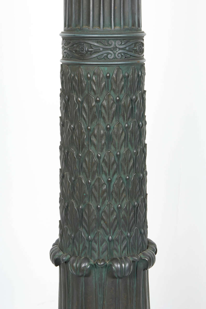 French Pair of Regency Bronze Tripod Torcheres.