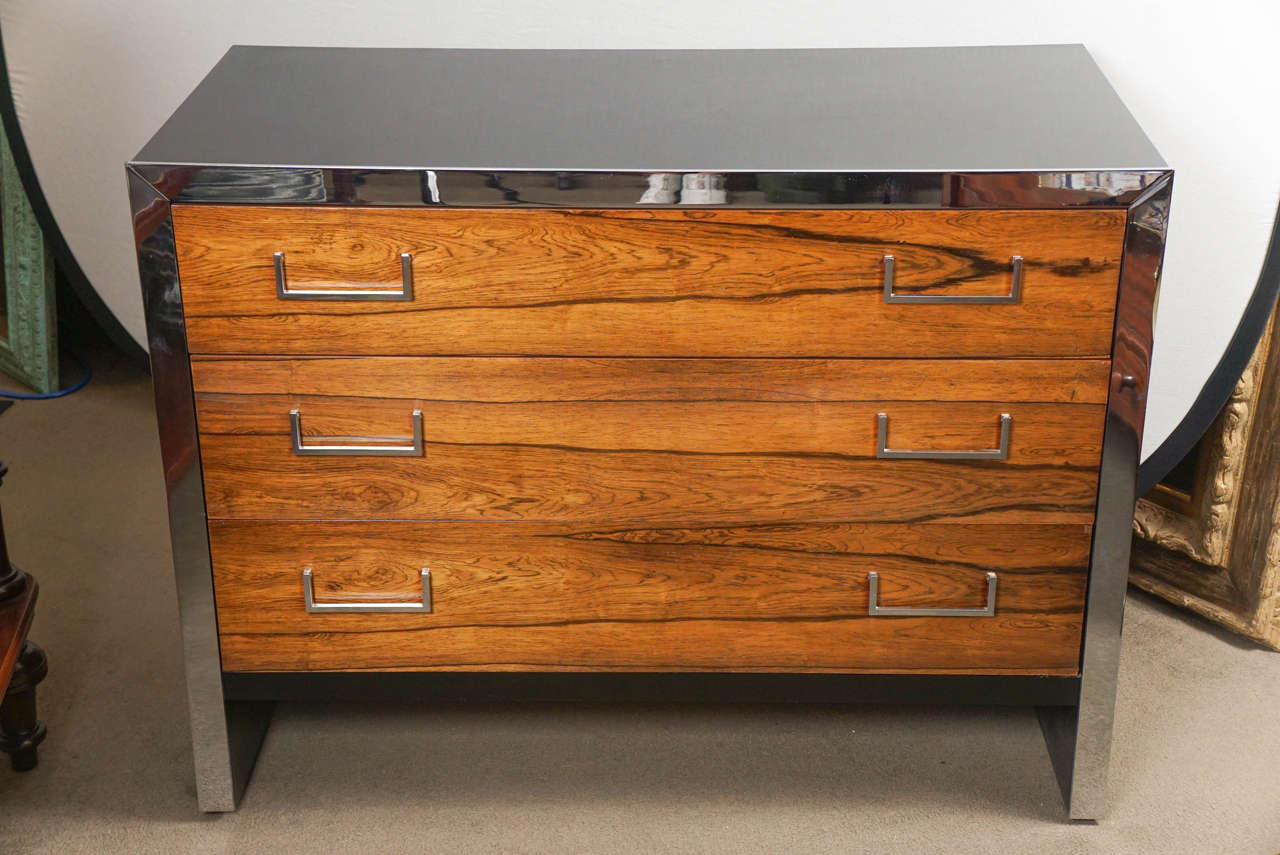 Rosewood and black lacquer chest with chrome details.