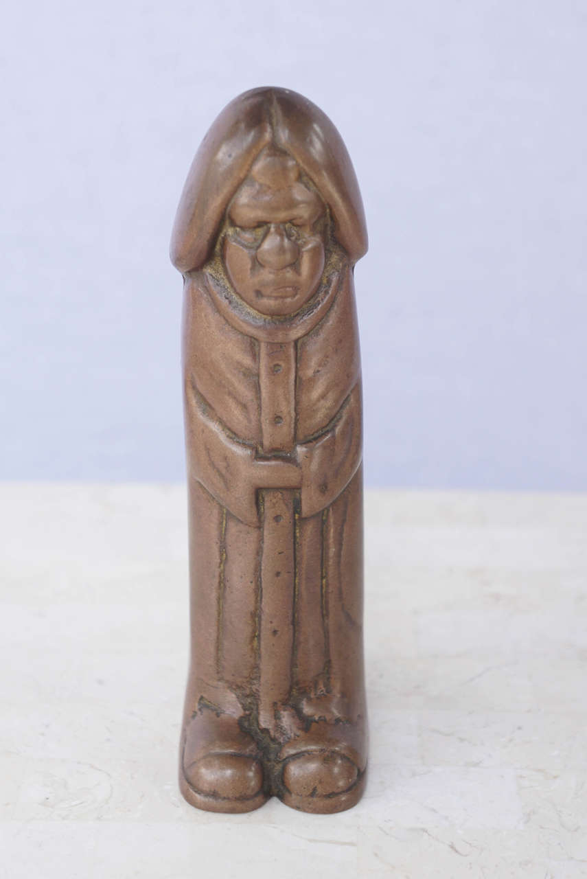 A figurative Bronze Phallic symbol