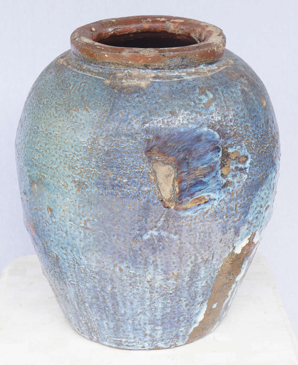A large blue glazed jug from China  from the 19th century.