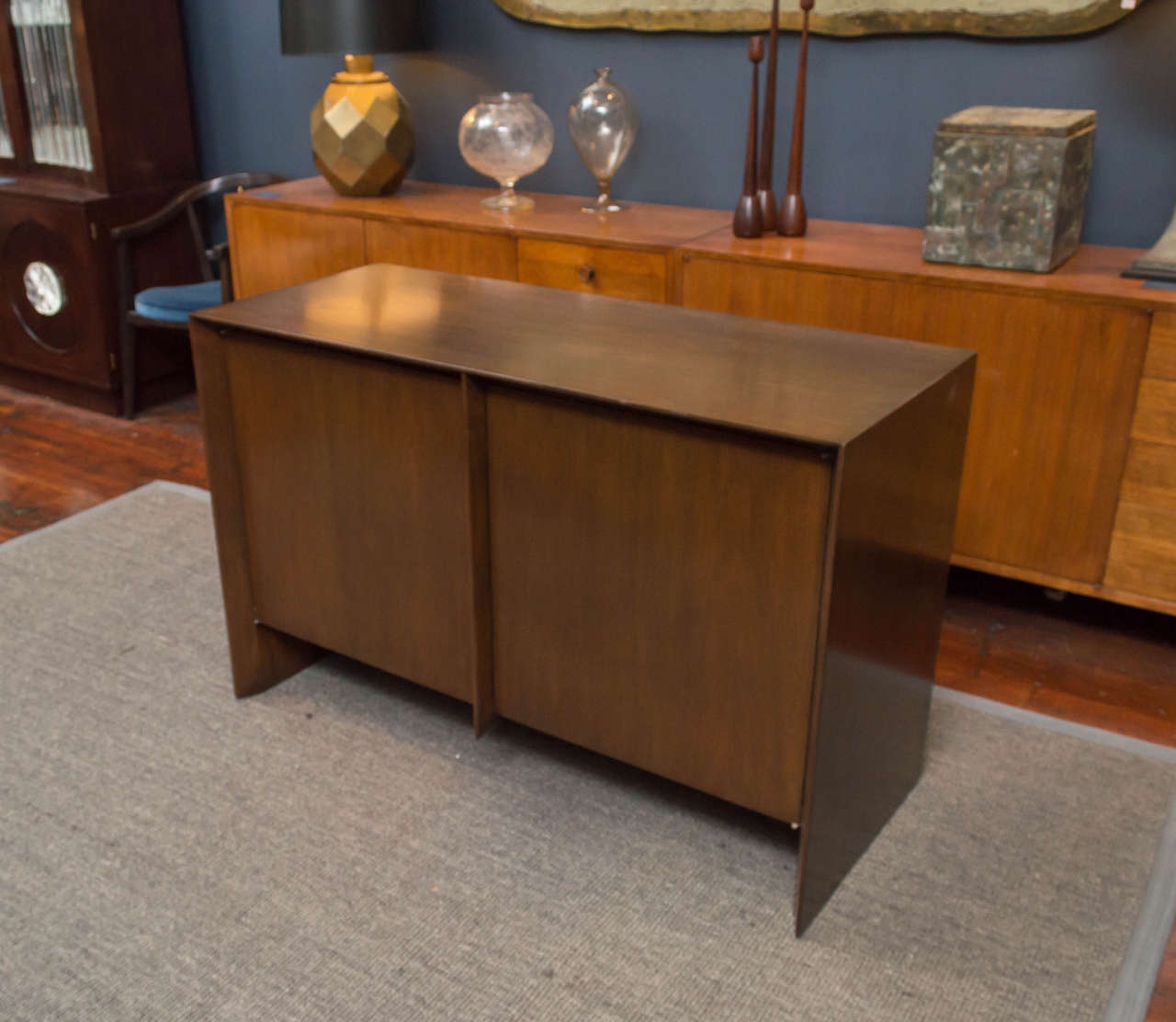Razor edge mahogany fram with two touch latch doors and fitted interiors. Perfectly refinished and labeled.