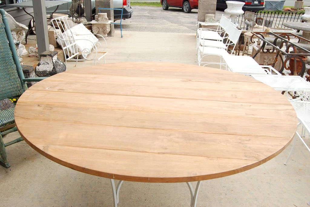 Indoor or Outdoor Round Teak and Metal Base Garden Dining Table In Good Condition In Sheffield, MA