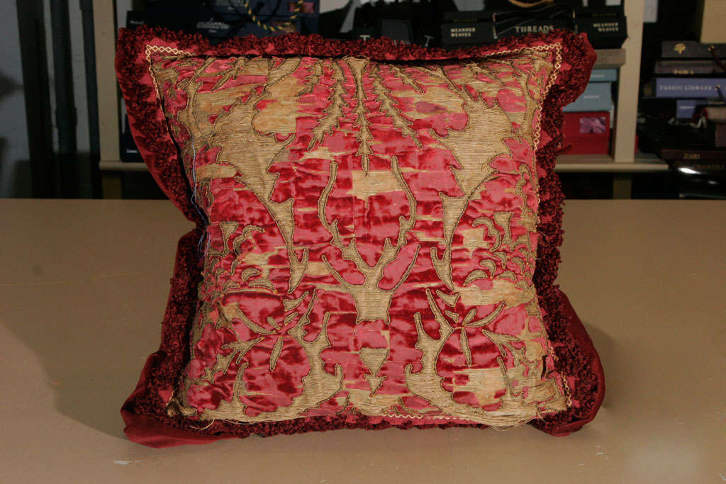 A set of 2 Venitian Velvet Damask pillows with gold and silver thread decorations.