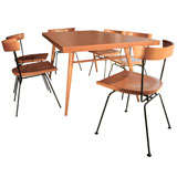 Planner Group Dining Table, 
Iron leg Chairs by Paul McCobb
