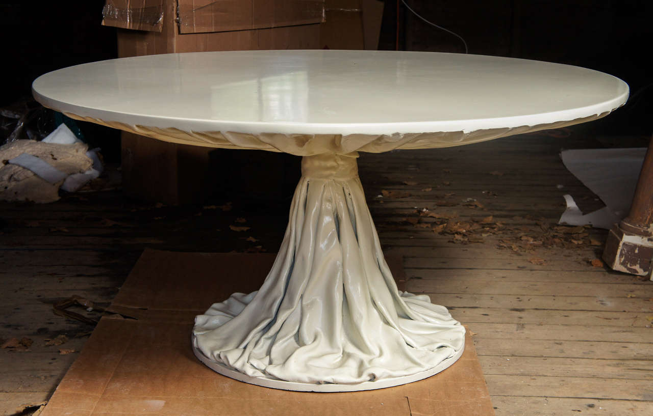 Stunning round white-enameled fiberglass dining or center table of large size by American designer Richard Himmel (1921- 2000), having realistically cast gathered drapery design pedestal support.  Incredibly chic piece.