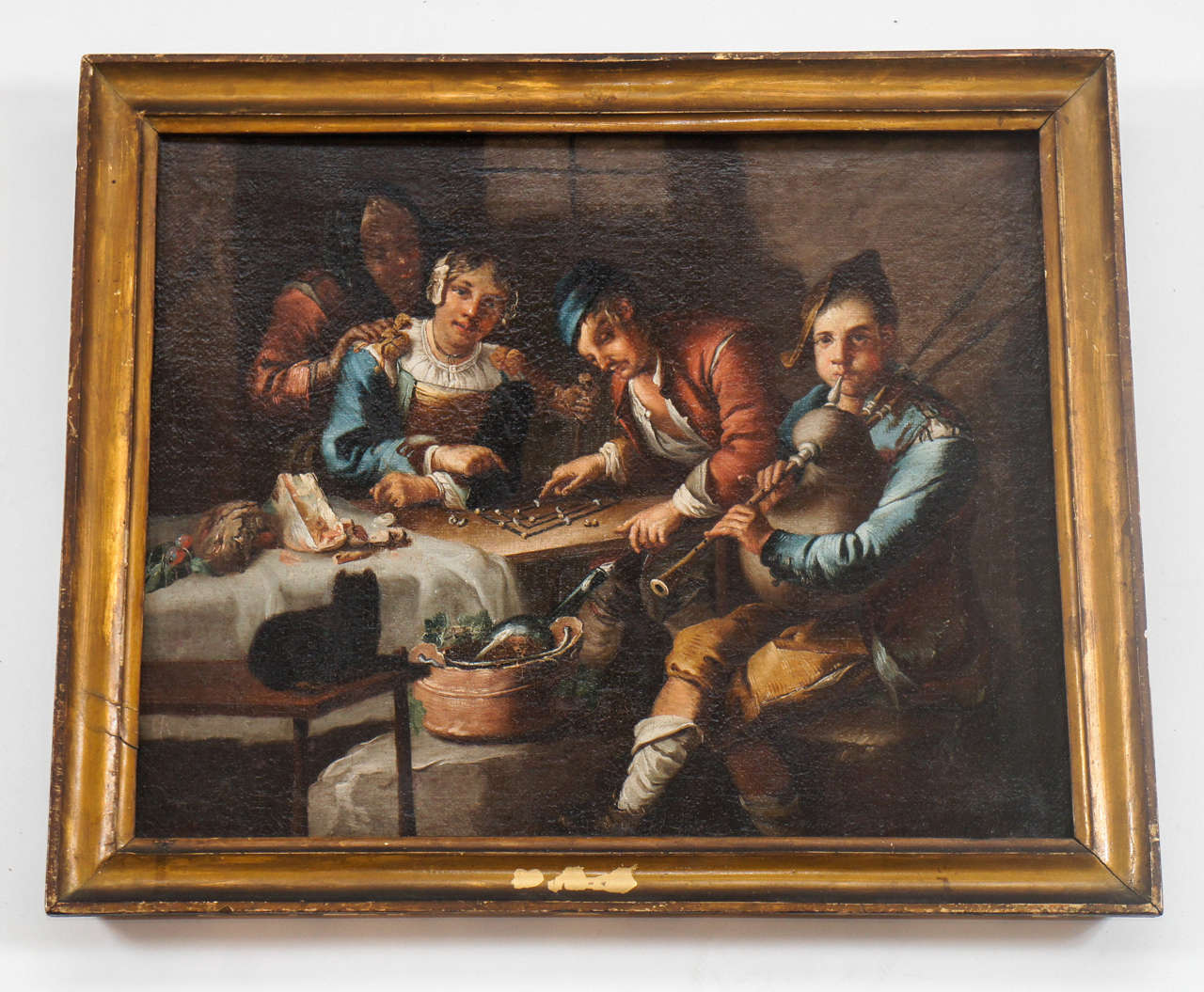 Wonderful early 17th century Dutch or Flemish genre painting of a gathering around a table with games and music; circle of Adriaen Brouwer (Oudenaarde, c. 1605 – Antwerp, January 1638).  Exceptionally fine technique and detail.  Featured in the 2016