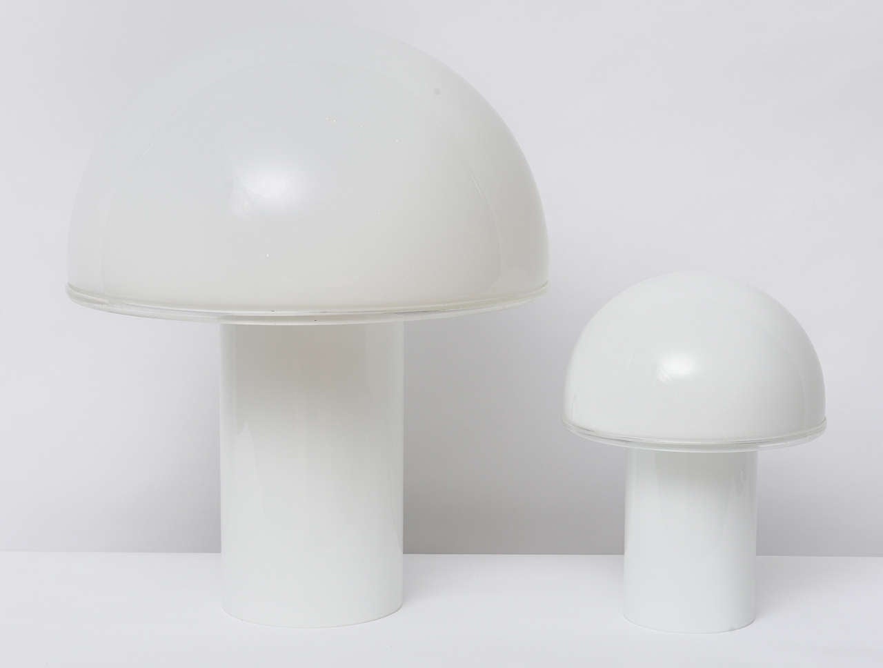 Beautiful pair of glass mushroom laps by Vistosi for Artemide.  Italy, 1970s

Items sold as a set, but can be sold separately.  Please just inquire.
