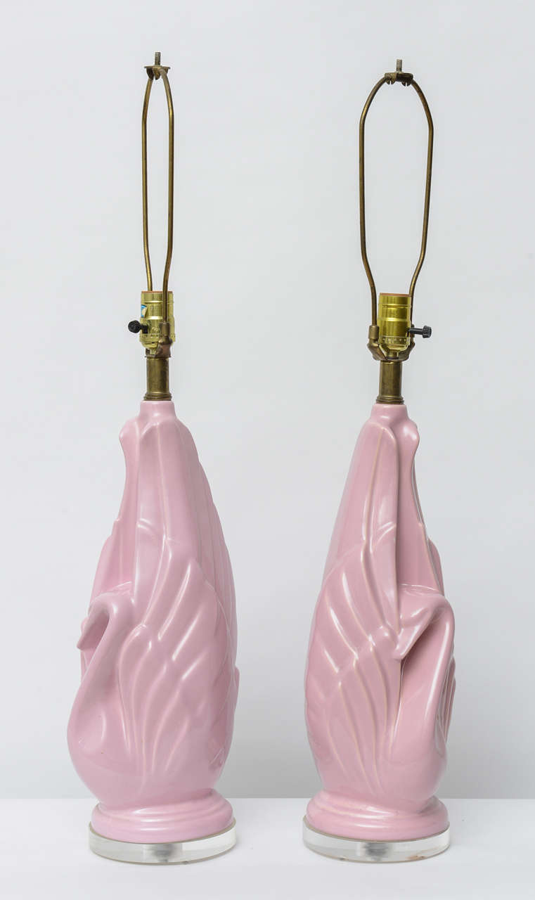 Amazing pair of pink ceramic and lucite swan lamps.  USA 1960s