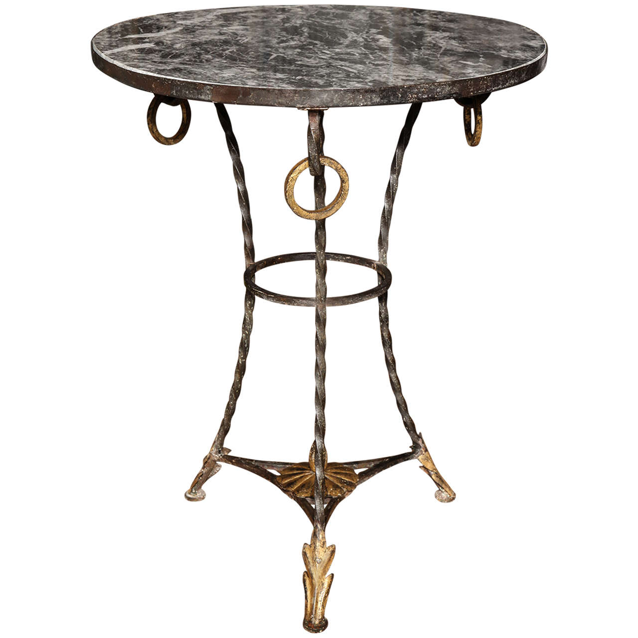 A Wrought Iron and Parcel Gilt Decorated Marble Topped Gueridon For Sale