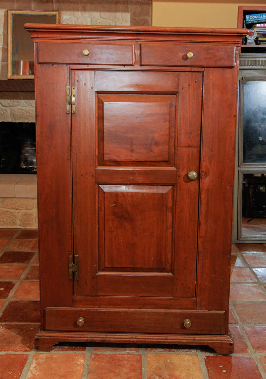 American 18th century cherrywood cupboard.

This is an early American kitchen cupboard that was often referred to as a 