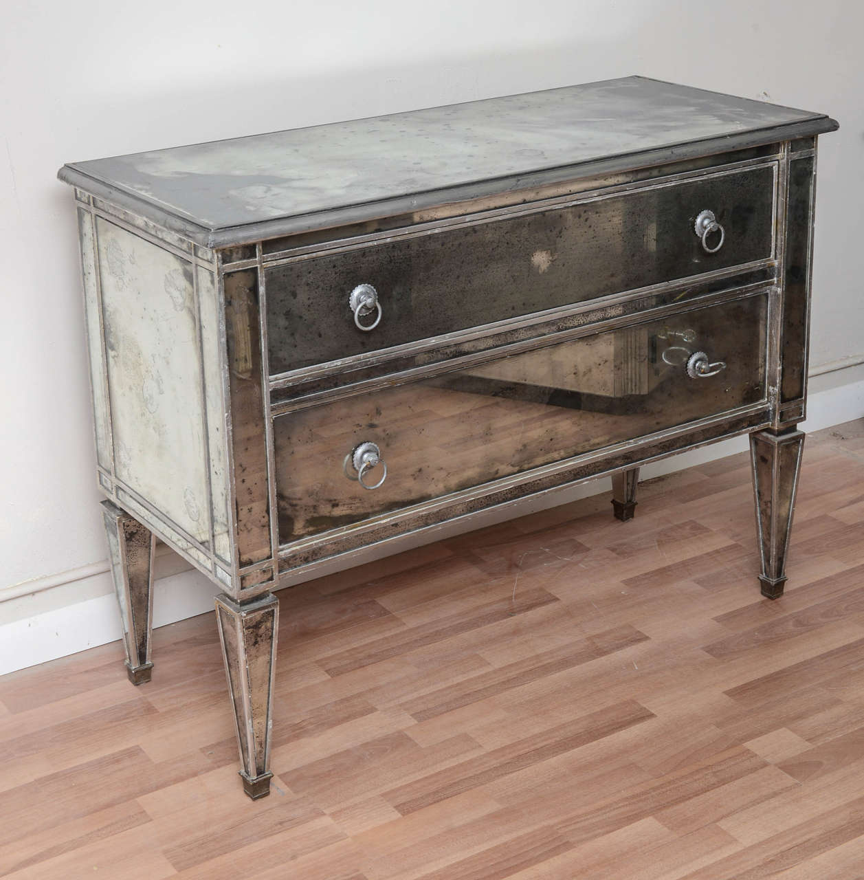 Two drawers mirrored Italian style chest with distressed mirrors and sliver gild.