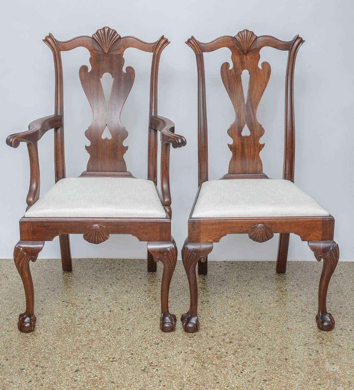 Set of six chairs comprising of a carver (armchair) and five side chairs all with new upholstered slip seats. Original restored finish.

Originally $ 2,950.00

Carver armchair is:
26