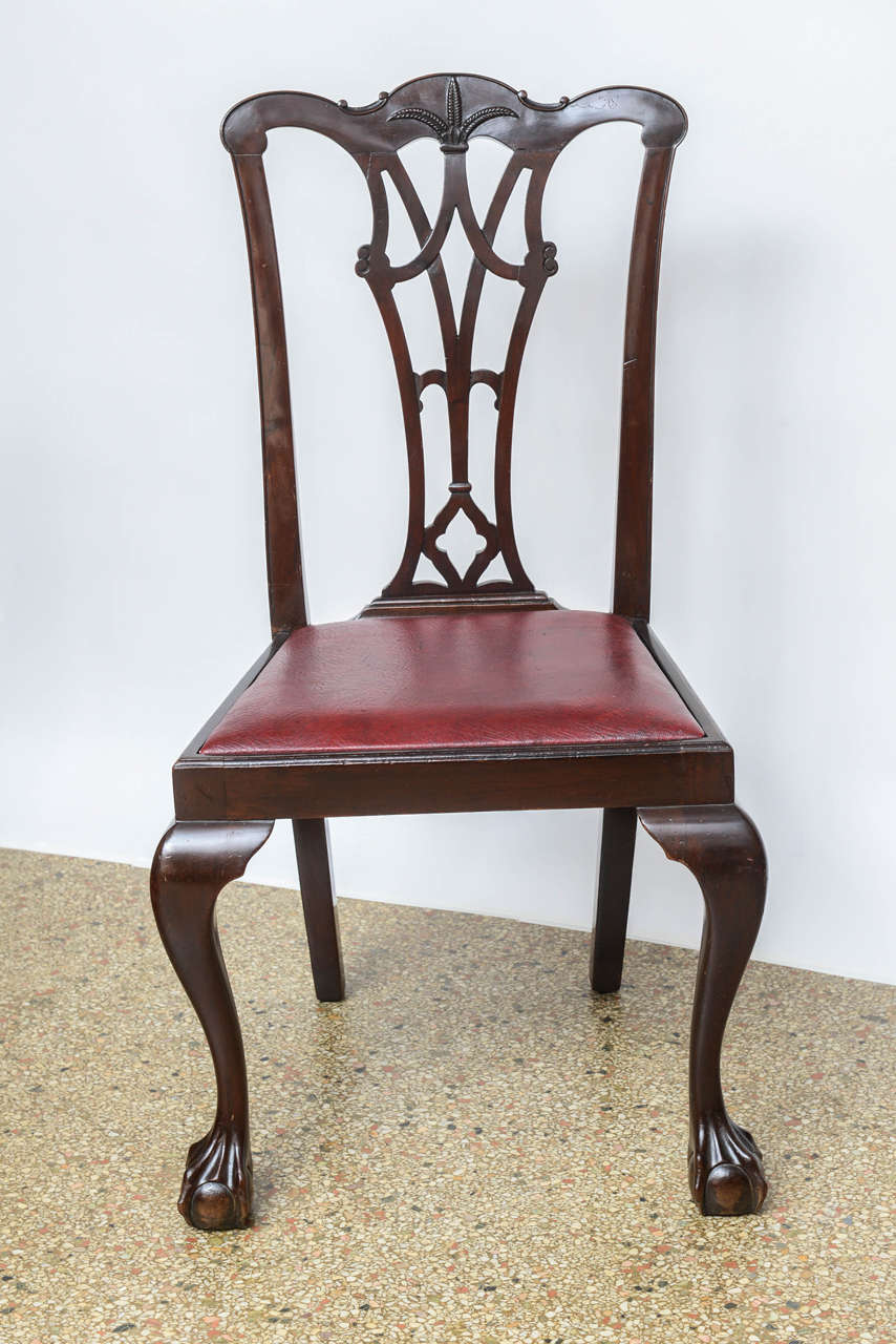 Well carved chair with all the details of an earlier chair.  Chair currently has a maroon colored vinyl slip seat.  Original restored finish

Originally $ 875.00