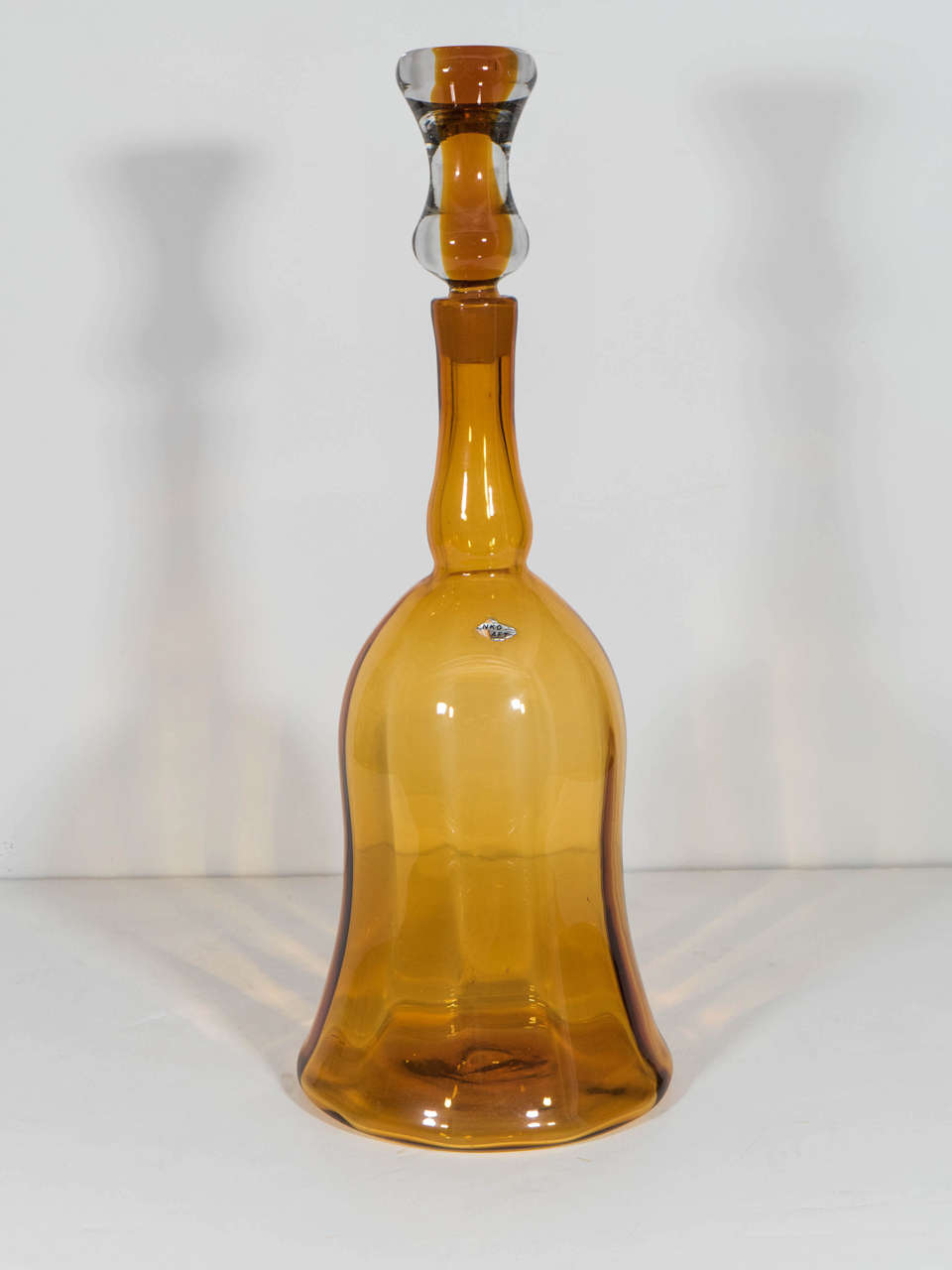 A vintage Blenko # 6934 blown glass decanter with crystal encased stopper in wheat. Designed in 1969 by Joel Myers for the Blenko Glass Co. of Milton, West Virginia.