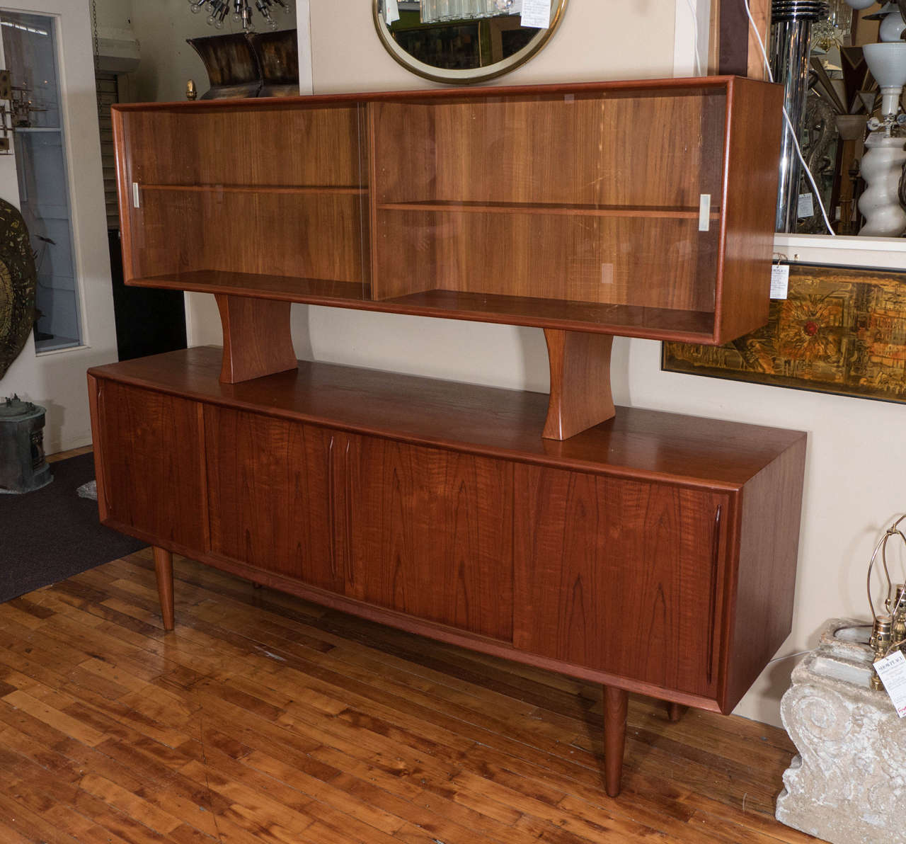 A vintage 1960s Arne Vodder for H.P. Hansen teak credenza and removable glass front cabinet top. Retains its original label.
Measurements:
Credenza: 79