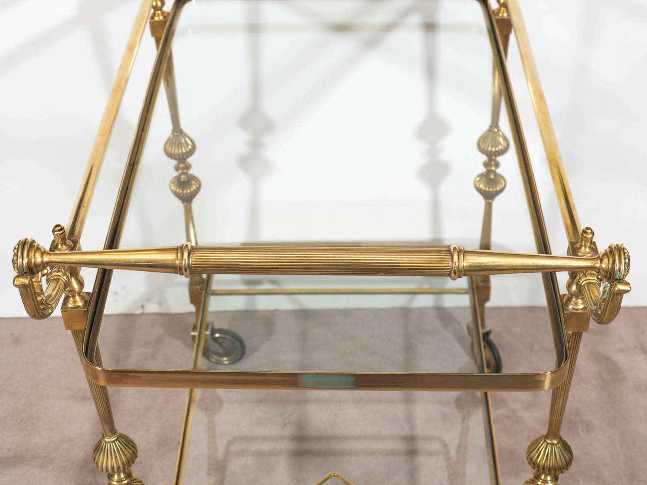 A Midcentury Hollywood Regency Brass Bar Cart with Wine Holders In Good Condition In Astoria, NY