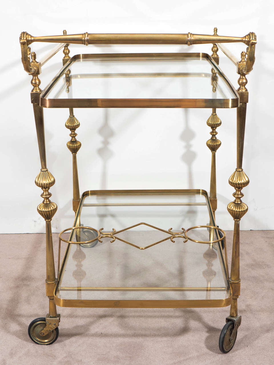 A Midcentury Hollywood Regency Brass Bar Cart with Wine Holders at