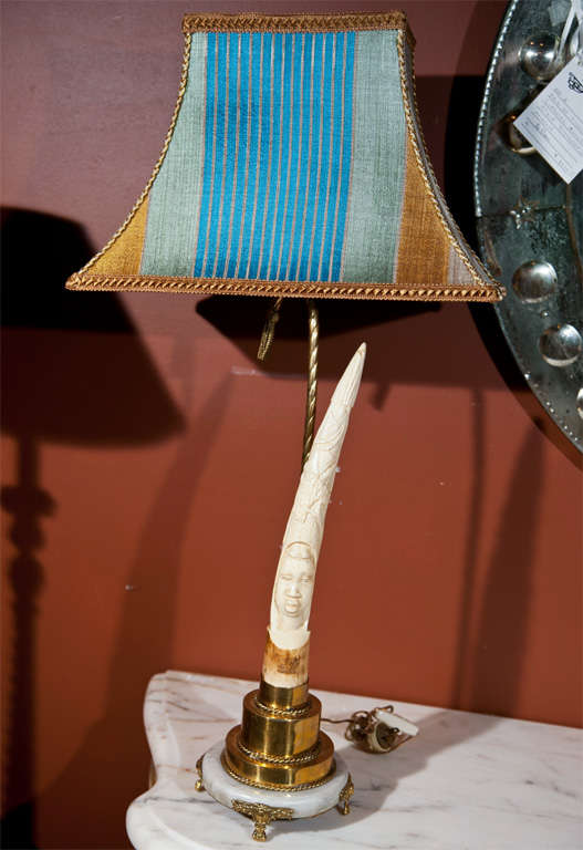 Handmade artisan lamp, with genuine antique ivory tusk carved into and African woman's head, comes with custom hand-woven lampshade.