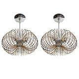 Pair of Modernist Solid Brass Coiled Chandeliers by Sciolari.