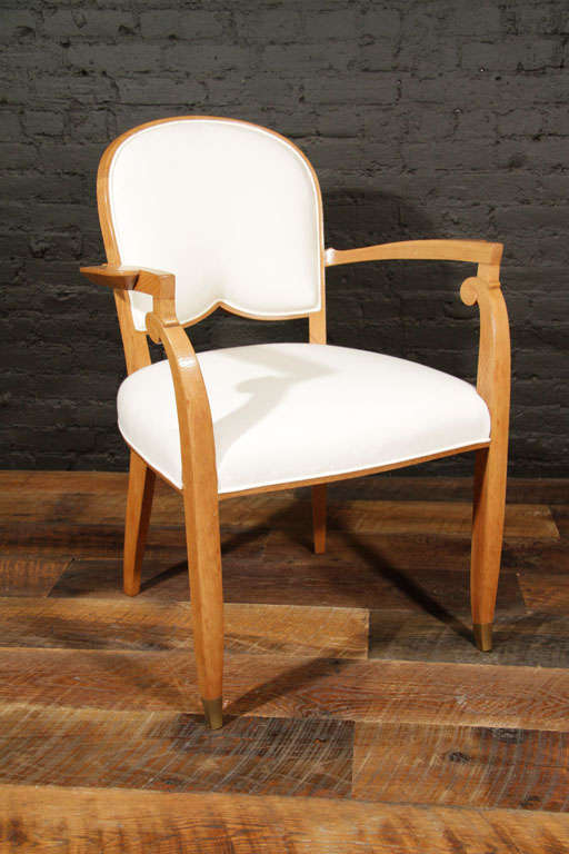 Fine Set of Six Polished Oak Armchairs by Jules Leleu (1883-1961)<br />
The front legs ending with bronze sabots <br />
<br />
Each armchair numbered respectively:<br />
“19384, 19393, 19395, 19397, 19400 & 19401”<br />
<br />
An identical