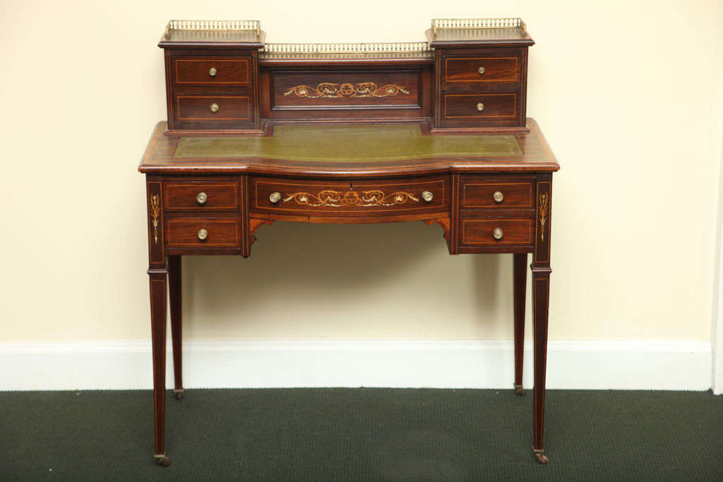 Edwardian rosewood and inlaid lady's writing desk, by Waring & Gillow, Lancaster, England.