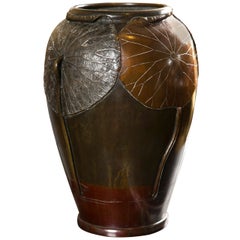 Antique A Japanese Bronze Vase With Applied Lotus Leaf Design