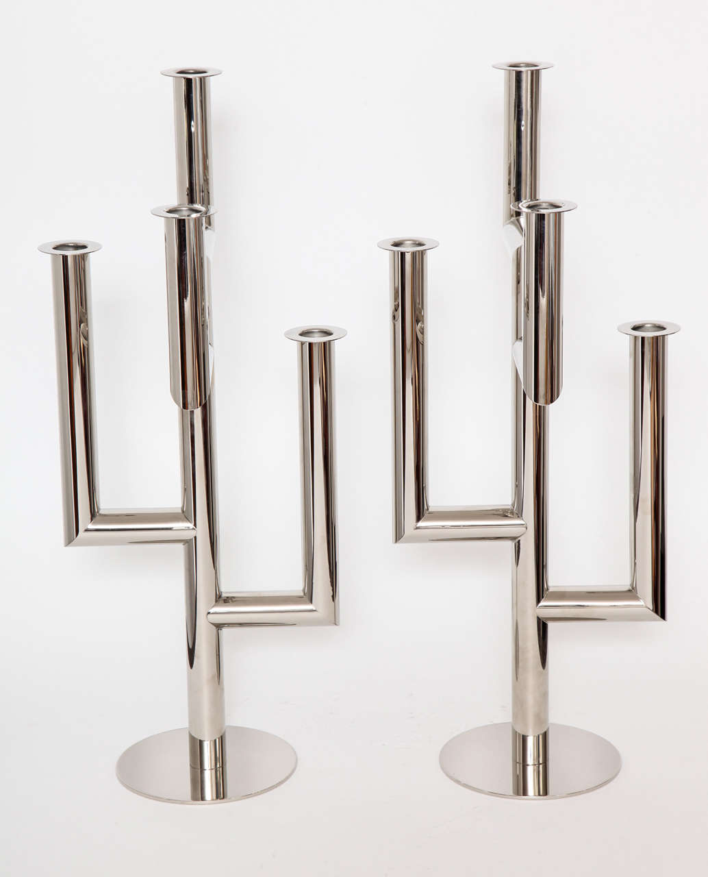 A Pair of Nickel Plated Brass, Austrian Art Deco Four Arm Candlesticks, designed by Karl Hagenauer,1930. Marked on 
Underside of Bases: WHW, HAGENAUER  WIEN,
 MADE in AUSTRIA.