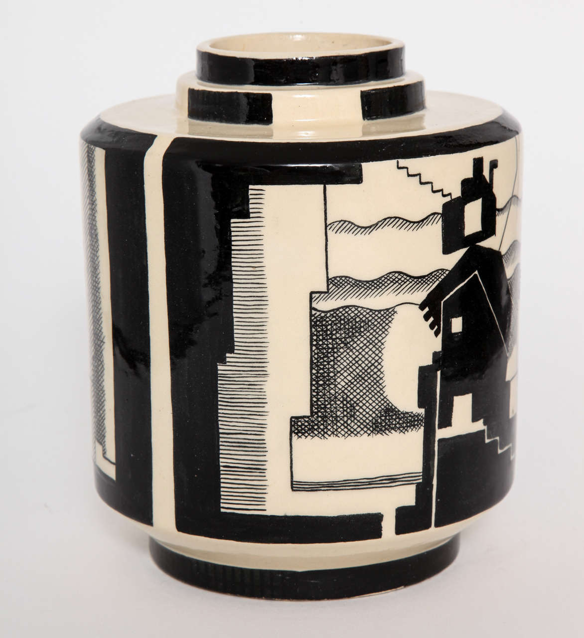 A French Art Deco ceramic vase designed and made by the ceramic artist Robert Lallemant in 1928. The black and white vase is decorated with a cubistic landscape. The underside has a 
 T Lallemant R France painted mark.