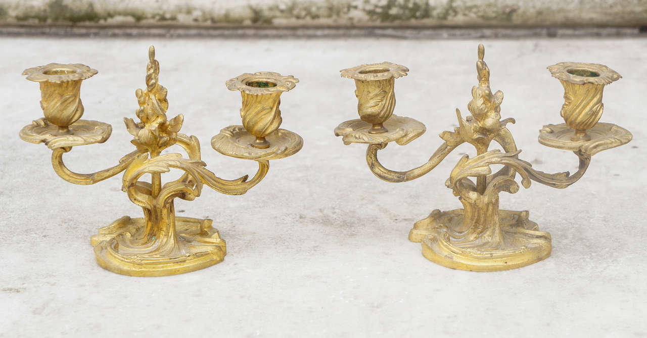 Gilded bronze candlesticks, very fine detail from the mid-18th century.