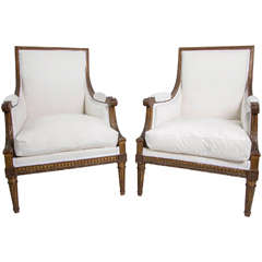 A Pair of French Louis XVI Large Bergeres