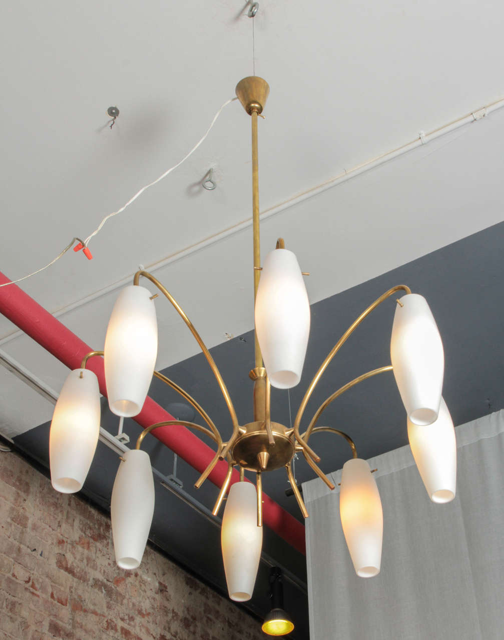 Mid-20th Century Italian Chandelier with Brass Frame and Eight Suspended Milk Glass Diffusers