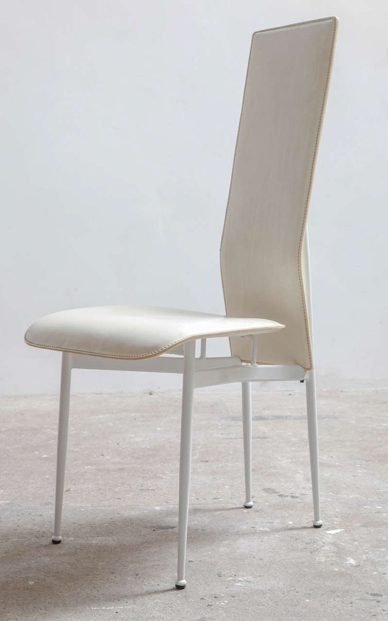 Contemporary chair,
S 44 by Giancarlo Vegni & Gianfranco Gualtierotti.
White painted steel structure. 
Seat and back cover in white leather.
Height: 103 cm,Seat height: 46 cm,Width: 44 cm,Depth: 58 cm.
Original guarantee conditions 1982.
