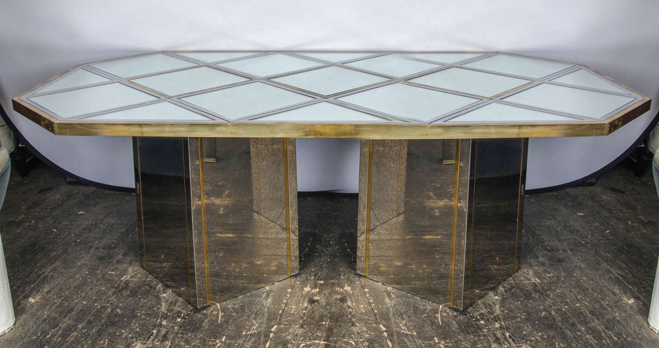 Large, elegant Italian dining table in polish chrome, brass and smoke mirror top by Romeo Rega.