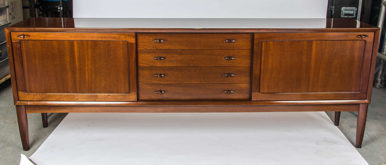 A nice example of a rare sideboard, designed by H.W. Klein for Danish Manufacturers, Bramin. Beautifully manufactured in teak.