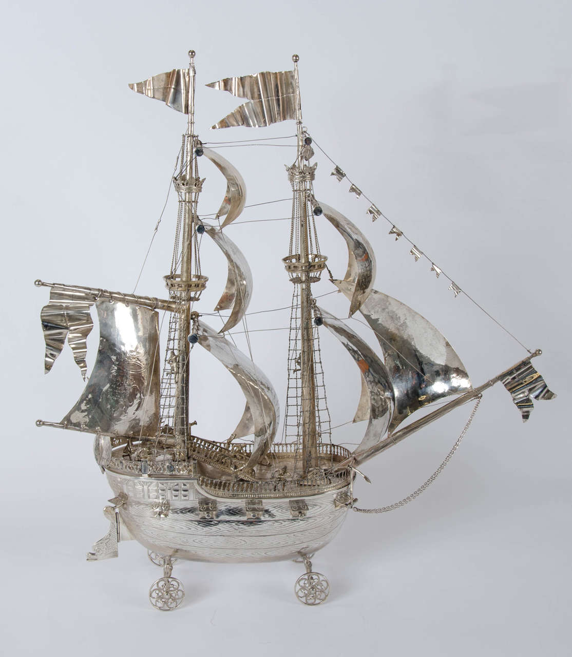 A very fine and impressive silver table nef made by Ludwig Neresheimer & Co of Hanau also struck with English silver import hallmarks for London, Berthold Mueller 1913. Weight of the galleon 3296 grams. This large silver galleon has the provenance