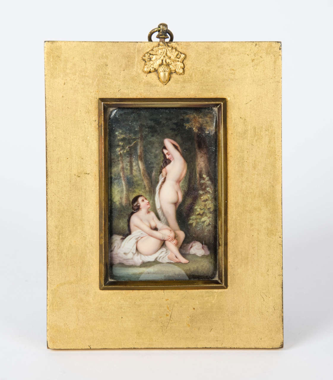A 19th century European hand painted rectangular cushion shaped porcelain plaque ( possibly KPM or Berlin ) depicting two erotic nude females in a woodland setting.