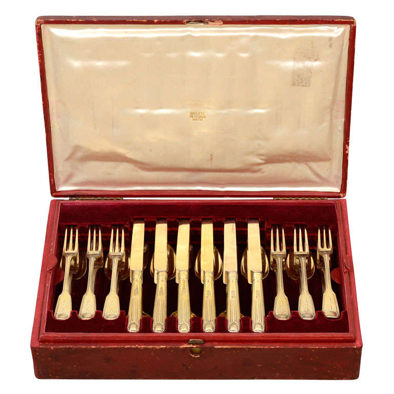 A Set of Silver-Gilt Flatware, retailed by Mallett