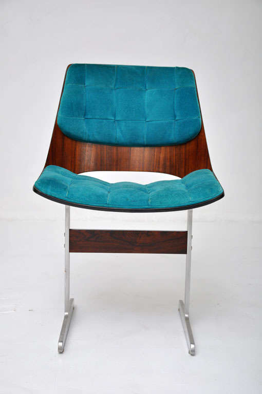 Set of 8 dining chairs designed by Jorge Zalszupin for L'Atelier.  Made in Brazil ca 1960's.  Rosewood  shells with original turquoise suede cushion.