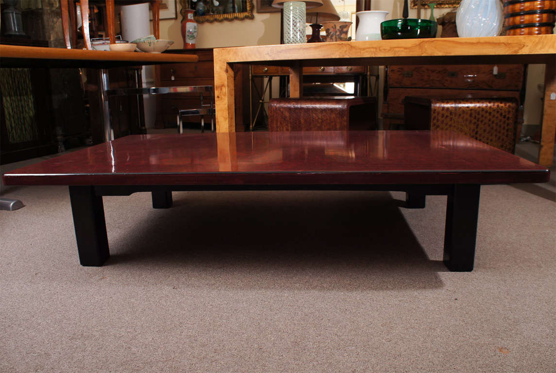 Negoro lacquer coffee table on black base. Two available. Price is per table.