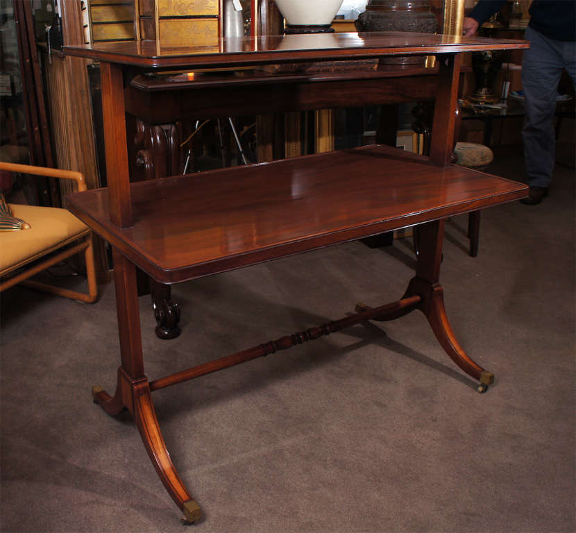 Mahogany Regency style etagere with ebony inlay and brass casters. Beacon Hill Collection.